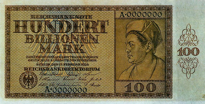 Hundert Billionen Mark Geldschein der Reichsbank mit dem Kopf eines Mannes darauf